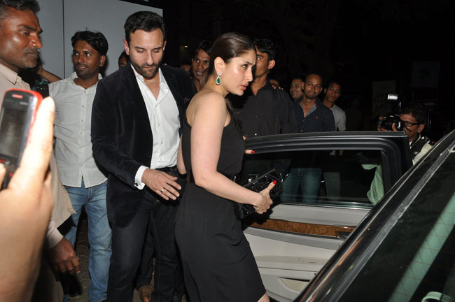 Saif cannot keep his hands off Kareena's behind